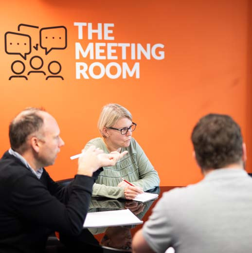 Staff in meeting room