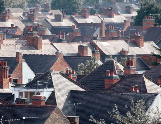 Sky view of roofs of houses